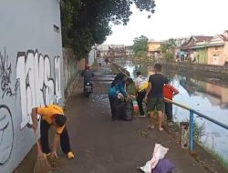 Sambut Hari Bhayangkara Ke-79 Personil Polsek Tamalate Bersih-Bersih Lingkungan Sungai
